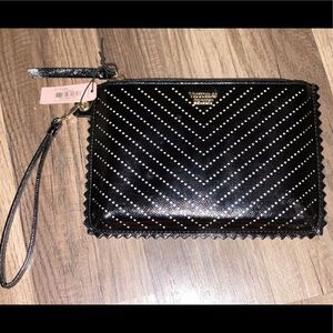 Victoria Secret wristlet. Color: Black. Never used